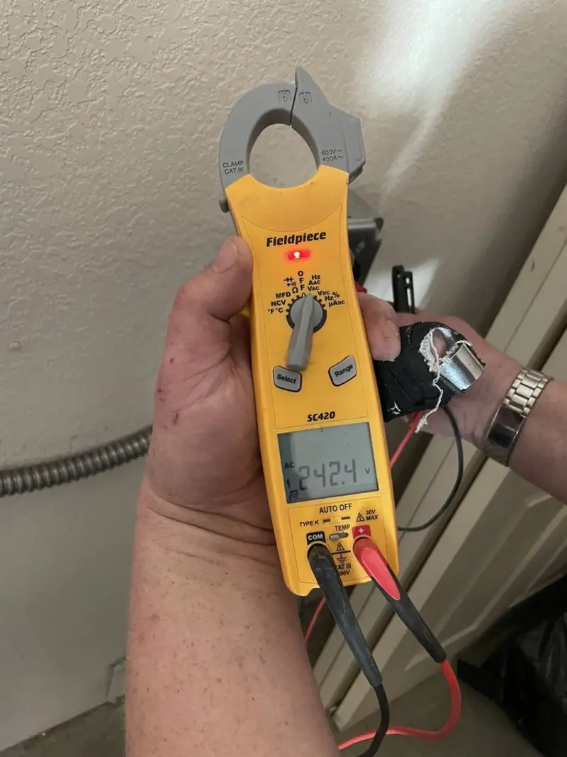 Voltage testing with clamp meter during Generator Installation in Woodside